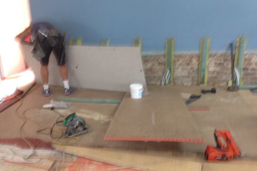 Laying Flooring in New Stage Area at West Ryde Family Church-The Right Builder